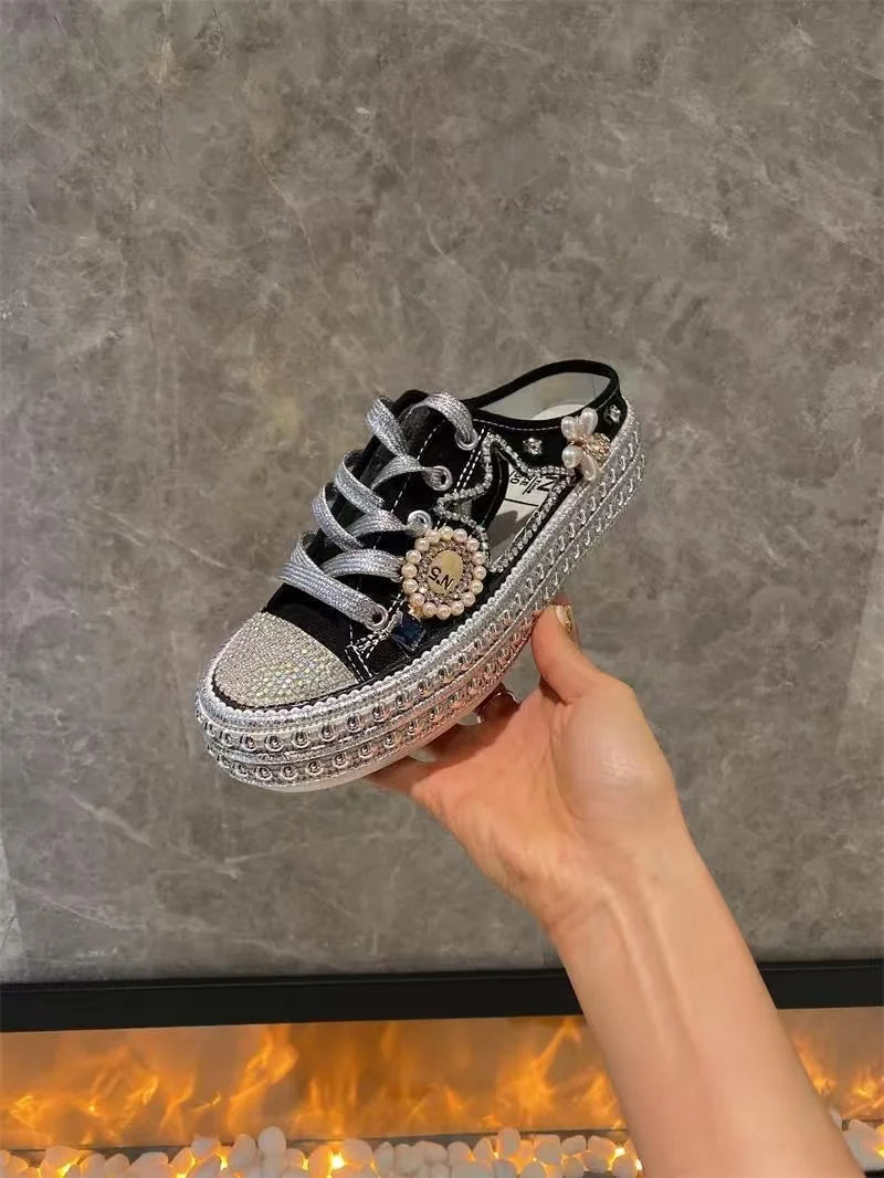 FOOTWEAR - Canvas shoes embellished with sparkling rhinestone diamonds, featuring handmade rivets, a half-slipper design, round toe, and a low heel, available in two colors.