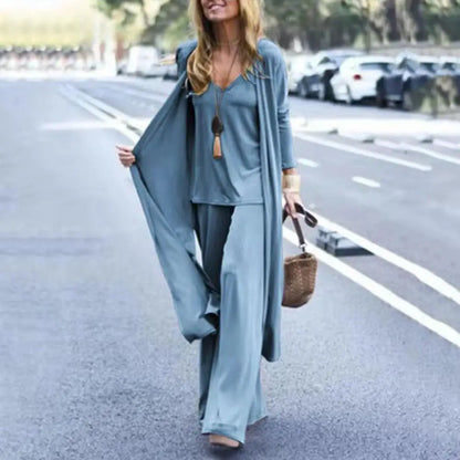 SETS - Chic and slimming, this solid-color three-piece casual outfit epitomizes versatility and style. The ensemble is ideal for any occasion and includes a V-neck camisole, wide-leg trousers, and a flowing long cardigan, all