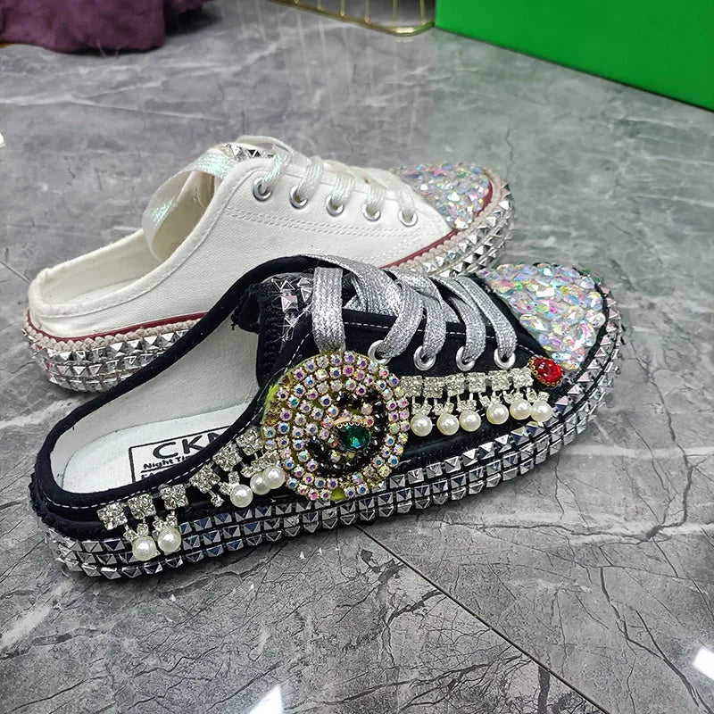 FOOTWEAR - Canvas shoes embellished with sparkling rhinestone diamonds, featuring handmade rivets, a half-slipper design, round toe, and a low heel, available in two colors.