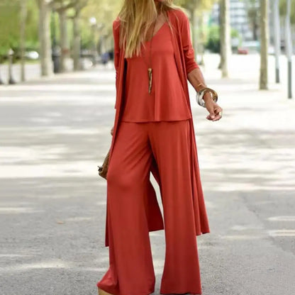 SETS - Chic and slimming, this solid-color three-piece casual outfit epitomizes versatility and style. The ensemble is ideal for any occasion and includes a V-neck camisole, wide-leg trousers, and a flowing long cardigan, all