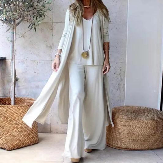 SETS - Chic and slimming, this solid-color three-piece casual outfit epitomizes versatility and style. The ensemble is ideal for any occasion and includes a V-neck camisole, wide-leg trousers, and a flowing long cardigan, all