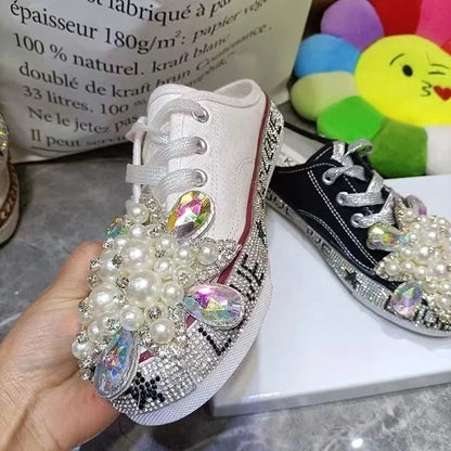 FOOTWEAR - Canvas shoes embellished with sparkling rhinestone diamonds, featuring handmade rivets, a half-slipper design, round toe, and a low heel, available in two colors.