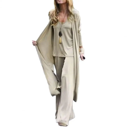 SETS - Chic and slimming, this solid-color three-piece casual outfit epitomizes versatility and style. The ensemble is ideal for any occasion and includes a V-neck camisole, wide-leg trousers, and a flowing long cardigan, all