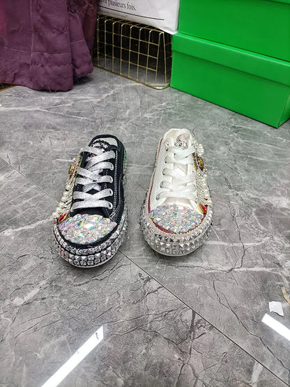 FOOTWEAR - Canvas shoes embellished with sparkling rhinestone diamonds, featuring handmade rivets, a half-slipper design, round toe, and a low heel, available in two colors.