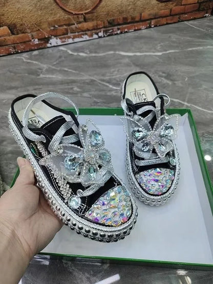 FOOTWEAR - Canvas shoes embellished with sparkling rhinestone diamonds, featuring handmade rivets, a half-slipper design, round toe, and a low heel, available in two colors.