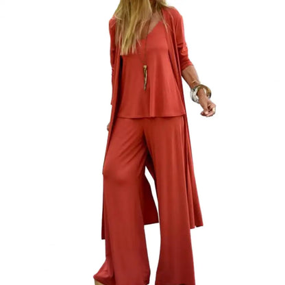 SETS - Chic and slimming, this solid-color three-piece casual outfit epitomizes versatility and style. The ensemble is ideal for any occasion and includes a V-neck camisole, wide-leg trousers, and a flowing long cardigan, all