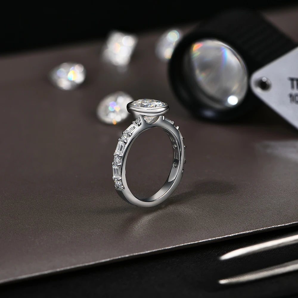 RINGS - Elegant Moissanite Diamond Fashion Rings, crafted in .925 Sterling Silver, are available with either White or Gold plating. Each ring features a dazzling oval-cut 2.0-carat Moissanite diamond stone that radiates sparkle.